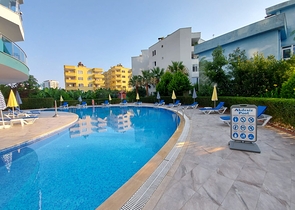 Меблированные апартаменты планировкой 1+1 в районе Махмутлар