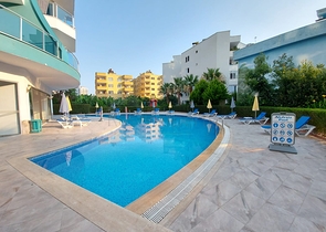 Меблированные апартаменты планировкой 1+1 в районе Махмутлар