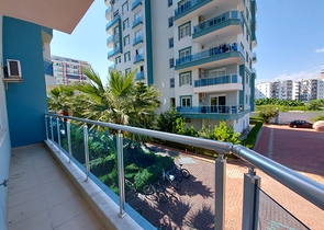 Меблированные апартаменты планировкой 1+1 в районе Махмутлар