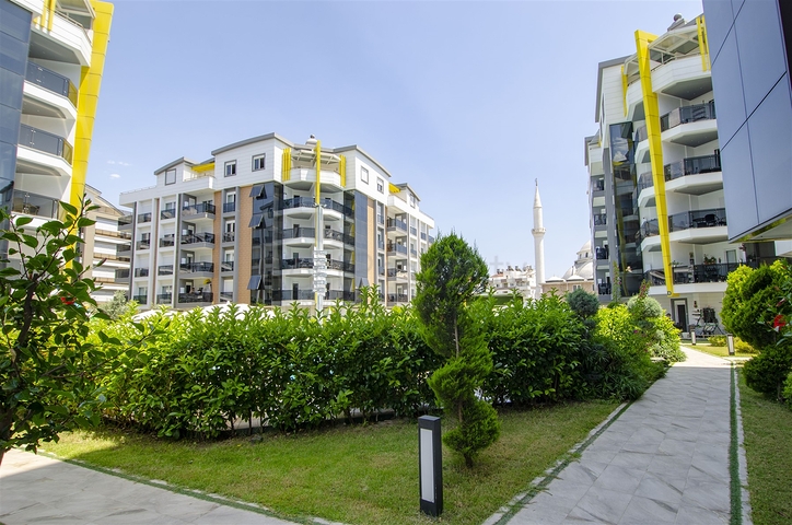 Двухкомнатная квартира с мебелью в элитном проекте в Коньяалты