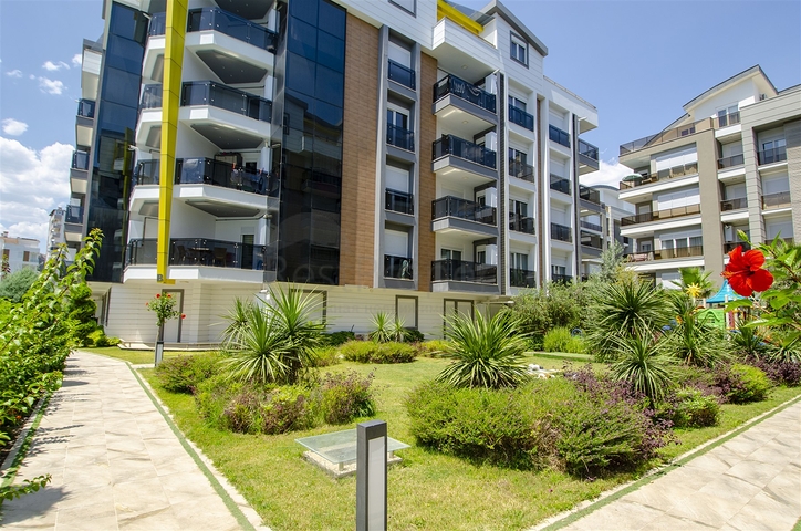 Двухкомнатная квартира с мебелью в элитном проекте в Коньяалты