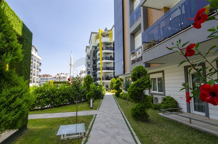 Двухкомнатная квартира с мебелью в элитном проекте в Коньяалты