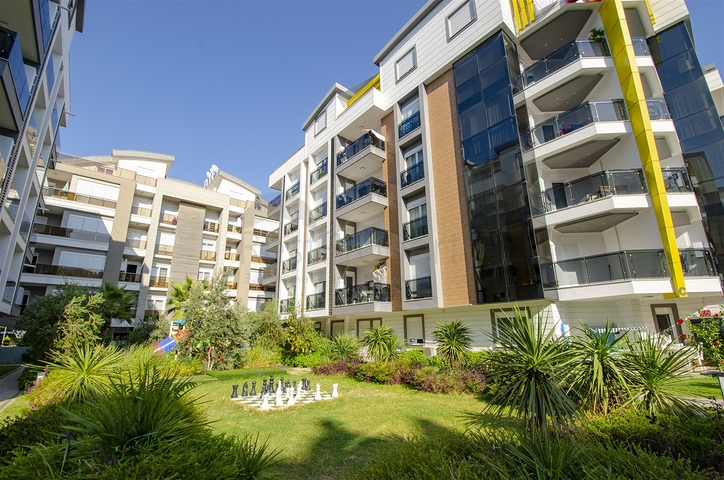 Двухкомнатная квартира с мебелью в элитном проекте в Коньяалты