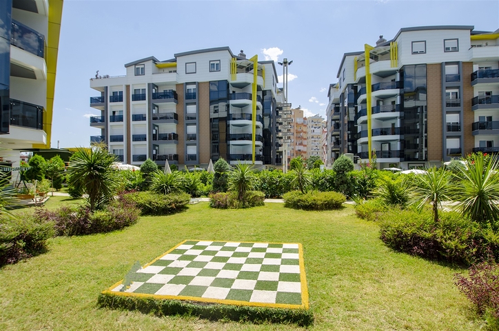 Двухкомнатная квартира с мебелью в элитном проекте в Коньяалты