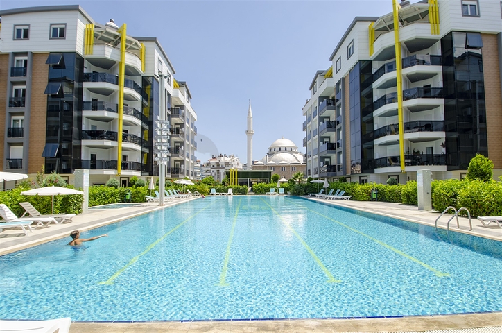 Двухкомнатная квартира с мебелью в элитном проекте в Коньяалты