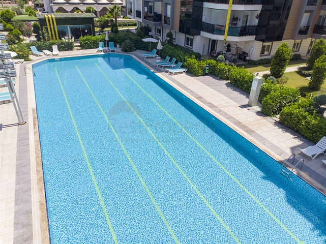 Двухкомнатная квартира с мебелью в элитном проекте в Коньяалты