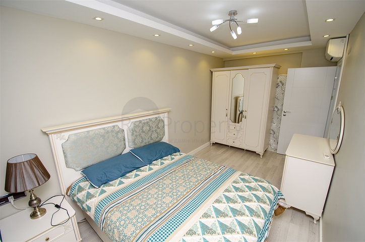 Двухкомнатная квартира с мебелью в элитном проекте в Коньяалты