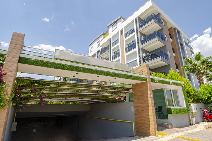 Двухкомнатная квартира с мебелью в элитном проекте в Коньяалты