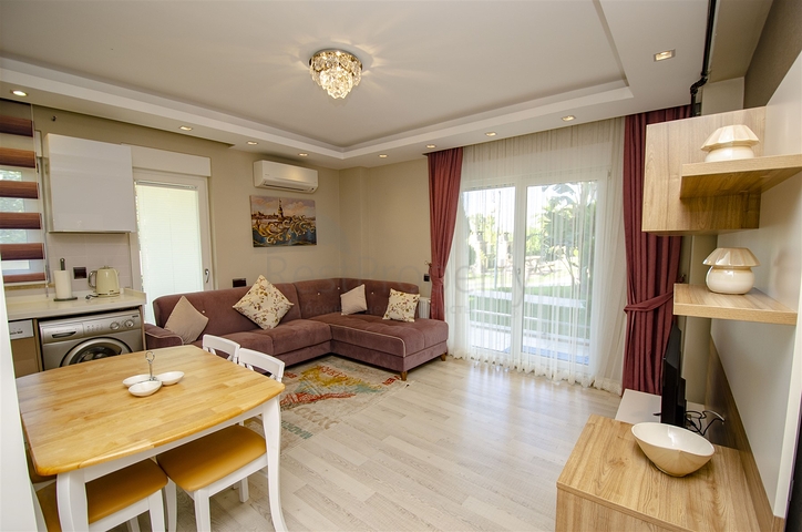 Двухкомнатная квартира с мебелью в элитном проекте в Коньяалты