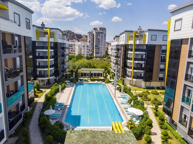 Двухкомнатная квартира с мебелью в элитном проекте в Коньяалты