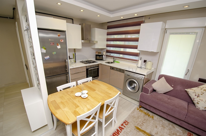 Двухкомнатная квартира с мебелью в элитном проекте в Коньяалты