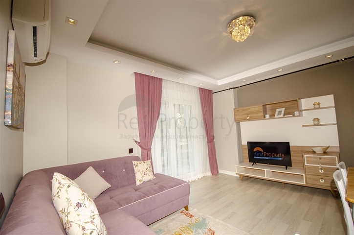 Двухкомнатная квартира с мебелью в элитном проекте в Коньяалты