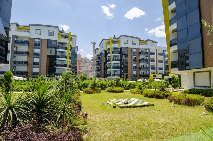 Двухкомнатная квартира с мебелью в элитном проекте в Коньяалты