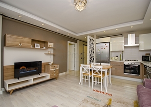 Двухкомнатная квартира с мебелью в элитном проекте в Коньяалты