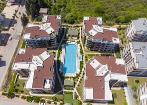 Двухкомнатная квартира с мебелью в элитном проекте в Коньяалты