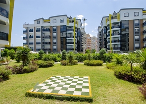 Двухкомнатная квартира с мебелью в элитном проекте в Коньяалты