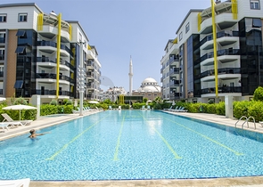 Двухкомнатная квартира с мебелью в элитном проекте в Коньяалты