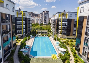 Двухкомнатная квартира с мебелью в элитном проекте в Коньяалты