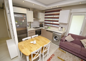 Двухкомнатная квартира с мебелью в элитном проекте в Коньяалты