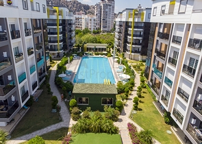 Двухкомнатная квартира с мебелью в элитном проекте в Коньяалты