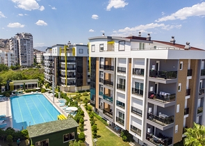 Двухкомнатная квартира с мебелью в элитном проекте в Коньяалты