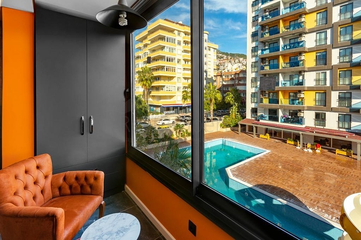 Меблированные апартаменты планировкой 1+1 в центре Алании