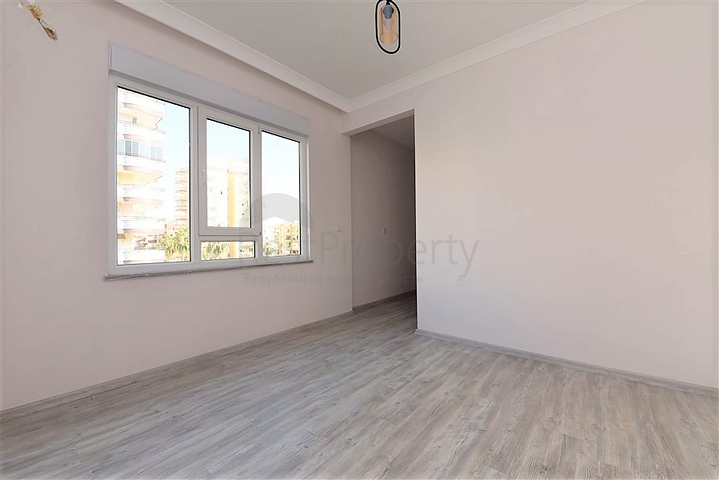 Новая квартира 2+1 с отдельной кухней в районе Махмутлар 