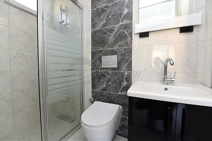 Новая квартира 2+1 с отдельной кухней в районе Махмутлар 