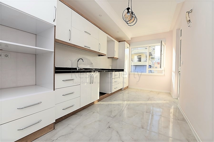 Новая квартира 2+1 с отдельной кухней в районе Махмутлар 