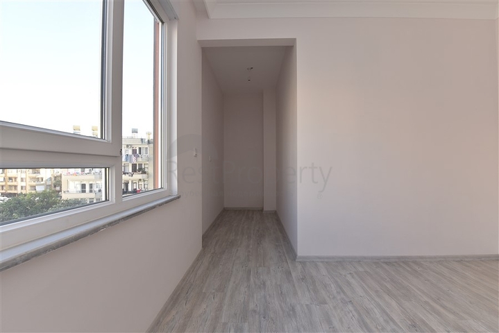 Новая квартира 2+1 с отдельной кухней в районе Махмутлар 