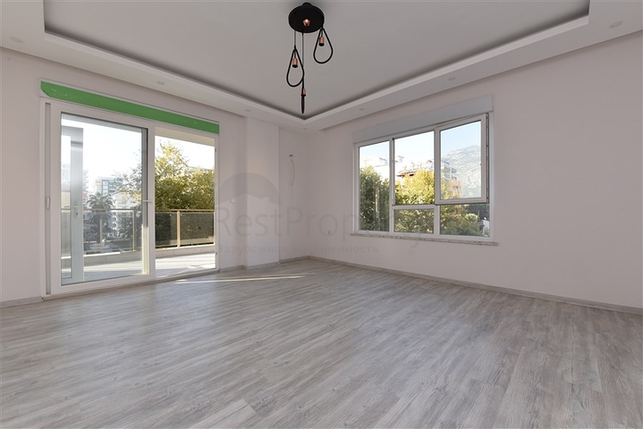 Новая квартира 2+1 с отдельной кухней в районе Махмутлар 