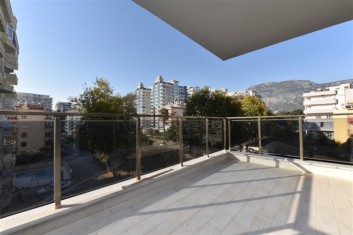 Новая квартира 2+1 с отдельной кухней в районе Махмутлар 