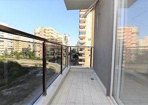 Новая квартира 2+1 с отдельной кухней в районе Махмутлар 