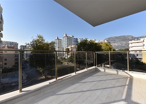 Новая квартира 2+1 с отдельной кухней в районе Махмутлар 