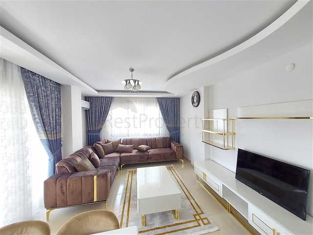 Двухэтажная квартира с мебелью в Махмутларе 