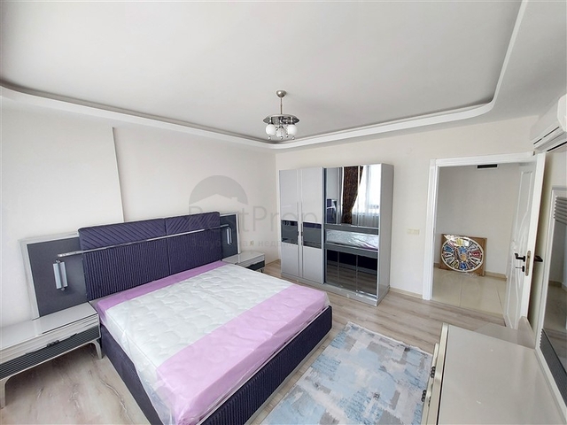 Двухэтажная квартира с мебелью в Махмутларе 