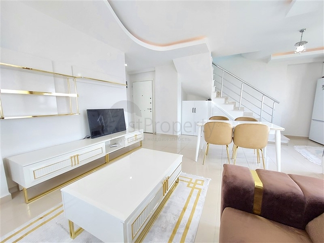 Двухэтажная квартира с мебелью в Махмутларе 