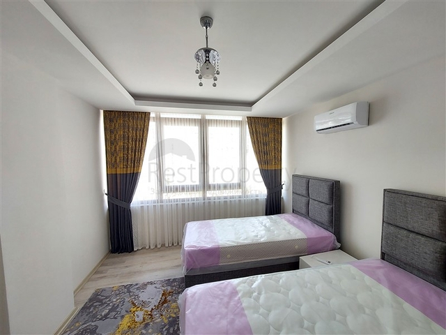 Двухэтажная квартира с мебелью в Махмутларе 