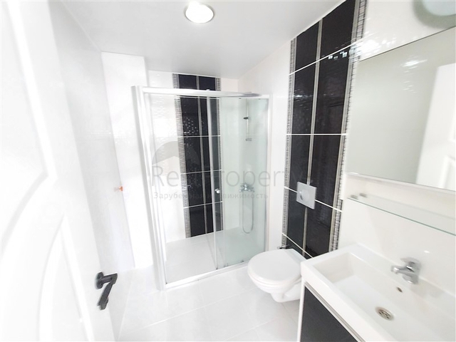 Двухэтажная квартира с мебелью в Махмутларе 