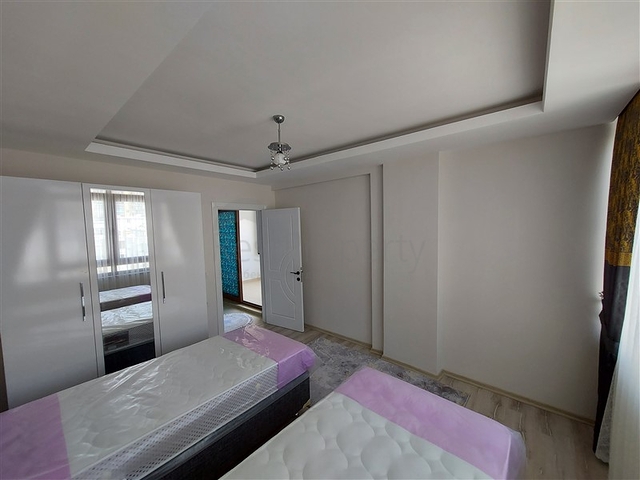 Двухэтажная квартира с мебелью в Махмутларе 