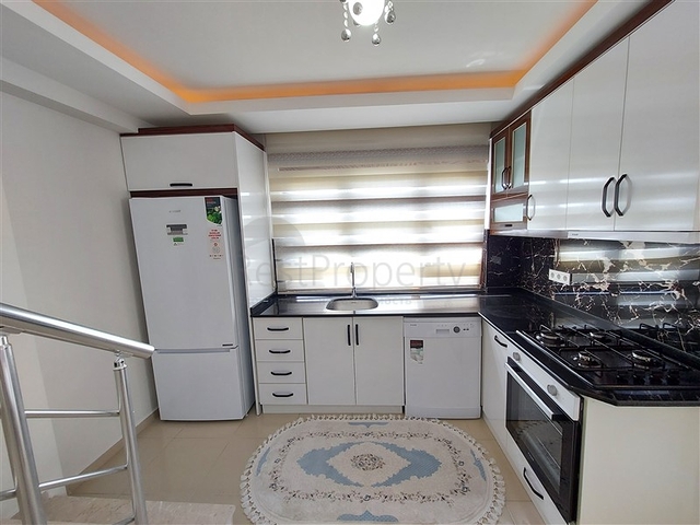 Двухэтажная квартира с мебелью в Махмутларе 