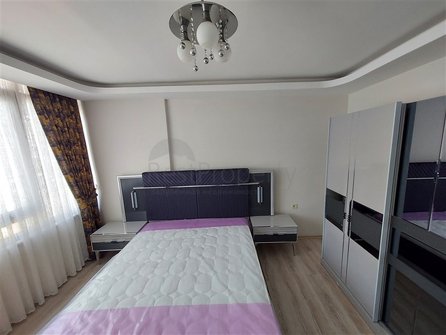 Двухэтажная квартира с мебелью в Махмутларе 