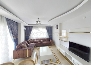 Двухэтажная квартира с мебелью в Махмутларе 