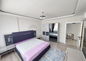 Двухэтажная квартира с мебелью в Махмутларе 