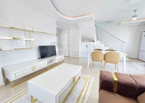 Двухэтажная квартира с мебелью в Махмутларе 