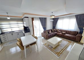 Двухэтажная квартира с мебелью в Махмутларе 