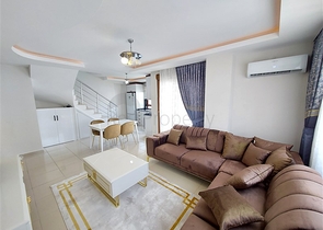 Двухэтажная квартира с мебелью в Махмутларе 