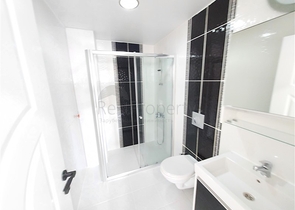 Двухэтажная квартира с мебелью в Махмутларе 