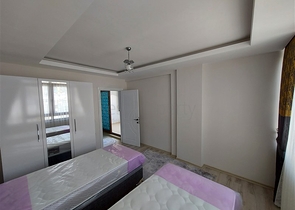 Двухэтажная квартира с мебелью в Махмутларе 