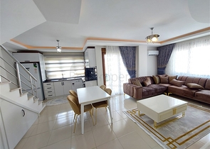 Двухэтажная квартира с мебелью в Махмутларе 